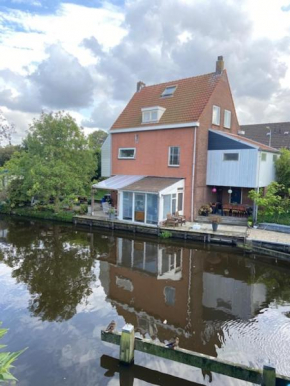 Characteristic detached house next to water